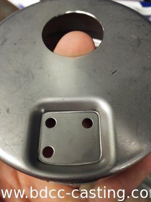 Alloggiamenti per manometri, parti stampate in metallo in acciaio inossidabile con tutti i tipi di finiture, parti stampate