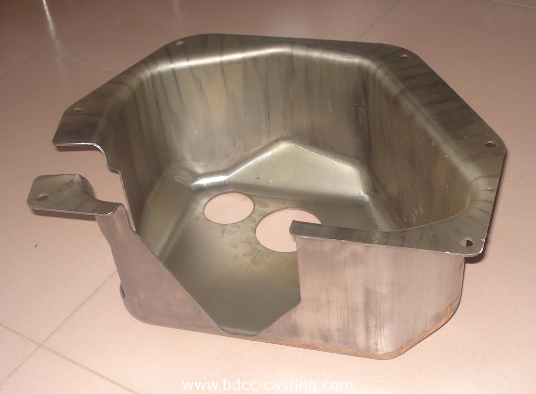 Stampaggio, Alloggiamenti per manometri, Parti stampate in metallo in acciaio inossidabile con tutti i tipi di finiture, Parti stampate